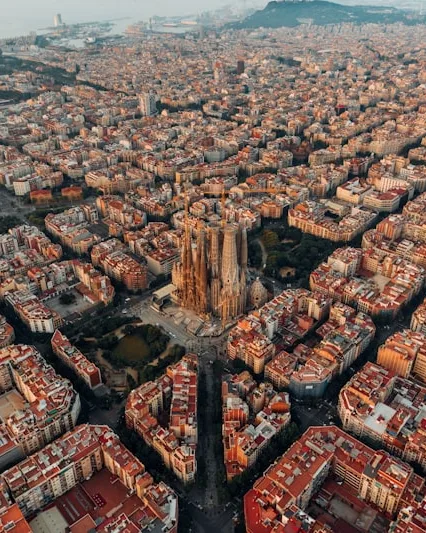 Aerial view of the Eixample grid in Barcelona, with the Sagrada Família at its centre